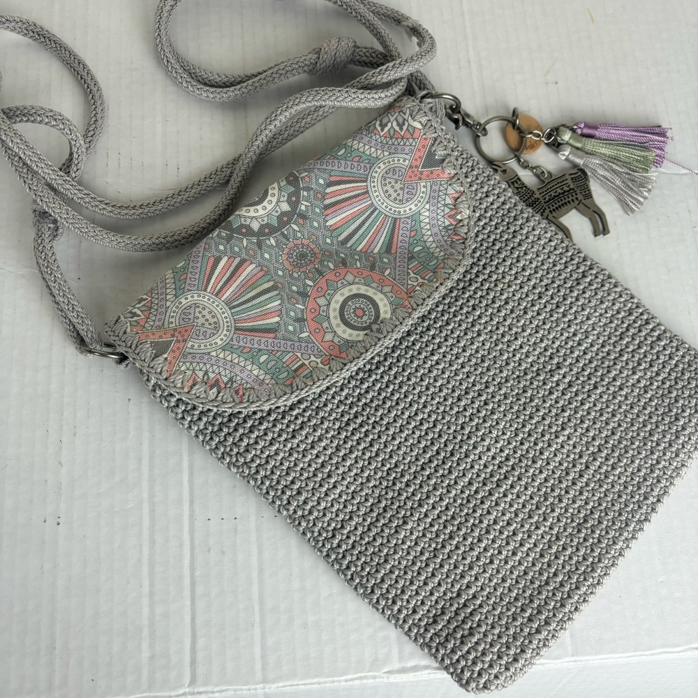Sakroots Crocheted Crossbody in grey/flap over/charms